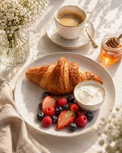 AI render: croissant with berries on linen